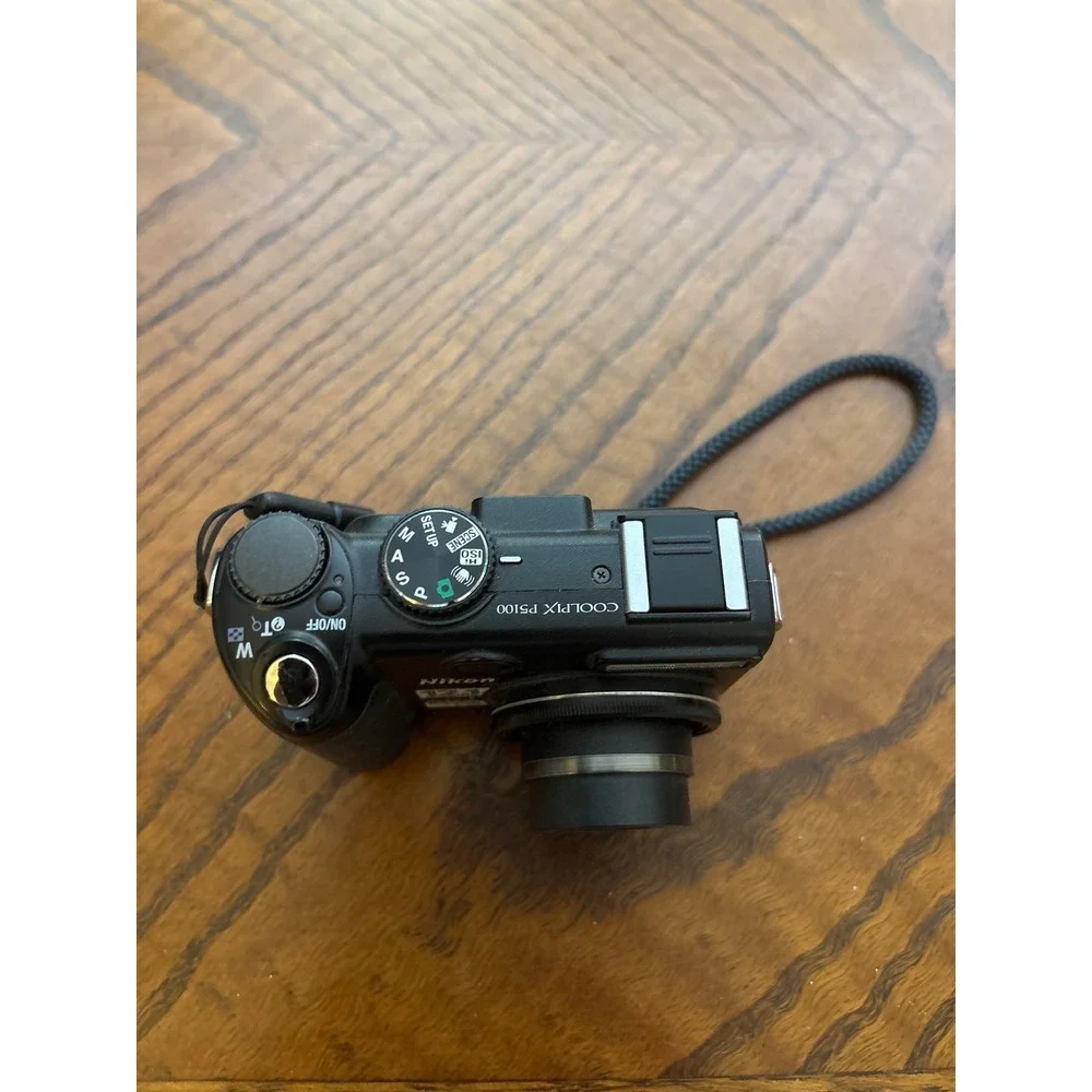 Nikon Coolpix P5100 12.1MP Digital Camera Black 3.5x Optical Zoom VR Magnesium